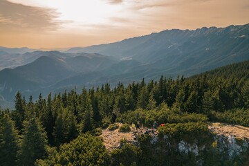 Aerial of Poiana Zanoaga in valley, Piatra Craiului natural reserve from Romania. Piatra Mica or Cabana Curmatura in Piatra Craiului National Park