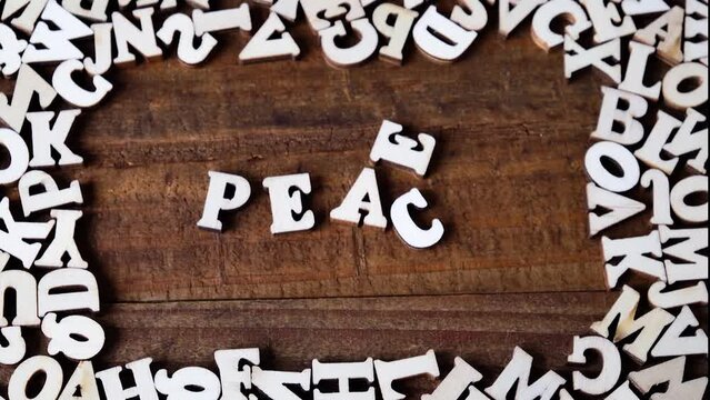 arrangement of letters to form the word "peace". world peace. not war.