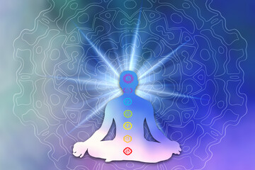 silhouette of a figure in yoga Lotus pose and chakras symbols