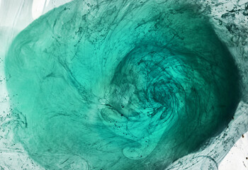 Green smoke on white ink background, colorful fog, abstract swirling emerald ocean sea, acrylic...