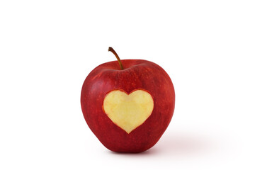 Fototapeta na wymiar Red apple with carved heart - Concept of love