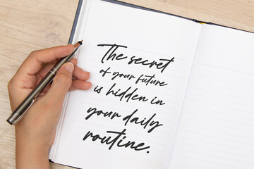 Handwriting text writing Your Daily Routine Matters on notebook