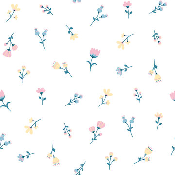 Vector flower seamless pattern on white background. small delicate flowers in pastel colors