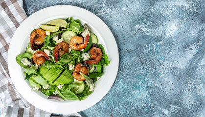 Vegan vegetarian dinner background. Seafood salad with avocado, blue cheese and smoked shrimps. Healthy eating concept. Detox diet. Vegetarian lunch. Weight loss