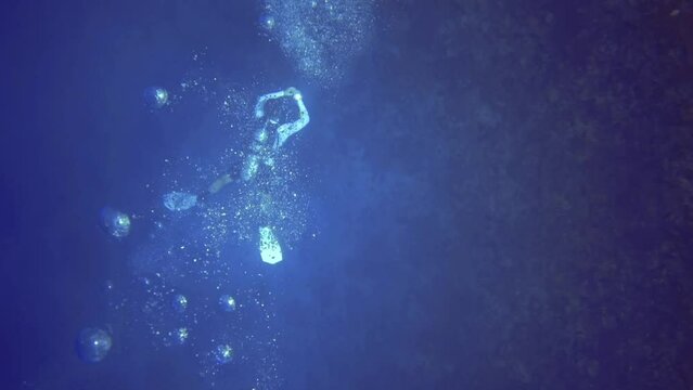 Top view of underwater camera man, who shot the coral reef. Maldives