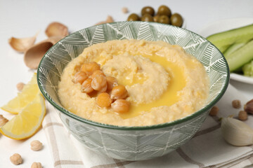 Concept of tasty food with hummus, close up