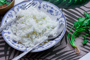 Steamed rice in an ancient plate and Stewed Eggs, Thai food and street food that are common in Thailand.