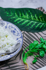 Steamed rice in an ancient plate and Stewed Eggs, Thai food and street food that are common in Thailand.