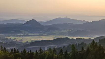 Scenic morning view from Ferlacher Spitze on Pyramidenkogel and Kathreinkogel in the Karawanks in Carinthia, Austria. Borders between Austria, Slovenia, Italy. Karawanks motorway, highway A2. Rosental