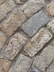 Paving old stones background closeup