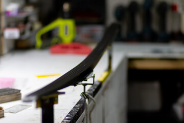 Installation of cross-country skis on the preparation machine