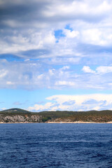 Fototapeta na wymiar Sailing boat and beautiful Adriatic sea landscape in Croatia.