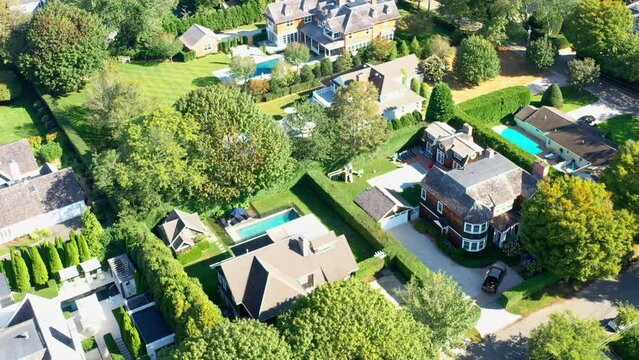 Villas in rich neighborhood in Southampton, Long Island, USA, drone.