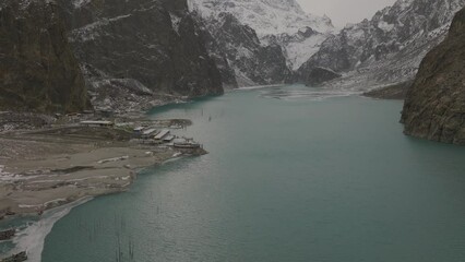 Aerial Over Attabad Lake, Revealing Mountain View, Hunza Valley. Dolly Back