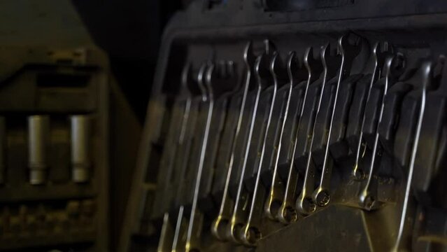 set of open-end and box metal wrenches. set of tools in a suitcase