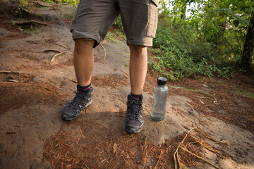 Close up shoes of traveler man hiking concept
