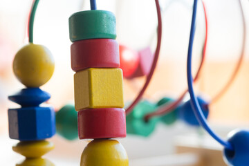 rings toys cubes and polygons on montessori toys with copy space for text