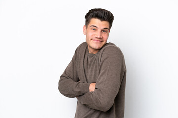 Fototapeta premium Young handsome caucasian man isolated on white bakcground making doubts gesture while lifting the shoulders