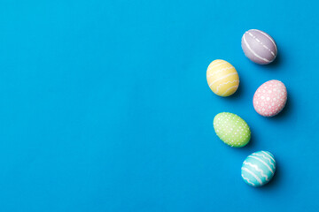 holiday preparation Multi colors Easter eggs on colored background . Pastel color Easter eggs. holiday concept with copy space