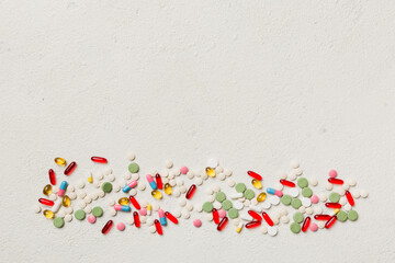 Protective face masks or surgical masks, medicine pills and thermometer on table background. Coronavirus disease. Corona virus concept. Space for text