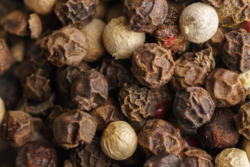 Mixed peppercorns, macro shot, top down view.