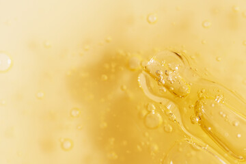 Vitamin C serum liquid texture with dropper, macro shot. - obrazy, fototapety, plakaty