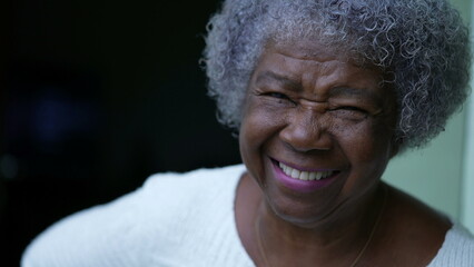 An African senior woman laughing and smiling portrait face
