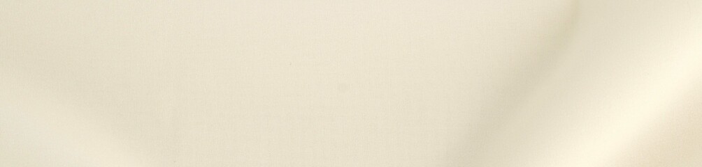 Smooth elegant creamy white silk or elegant satin texture can be used as background, elegant wedding background design.