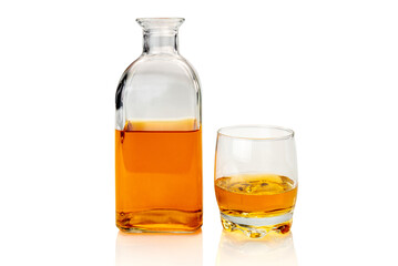 Glass bottle whiskey , or whisky or bourbon, near a glass of whiskey  isolated on white, clipping path