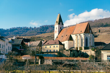 Fototapeta na wymiar Spitz an der Donau. Famous village and church at the danube river in the Wachau Region of Lower Austria