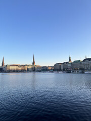 Hamburg Jungfernstieg view of Alster lake with crowded Jungfernstieg in Hamburg on