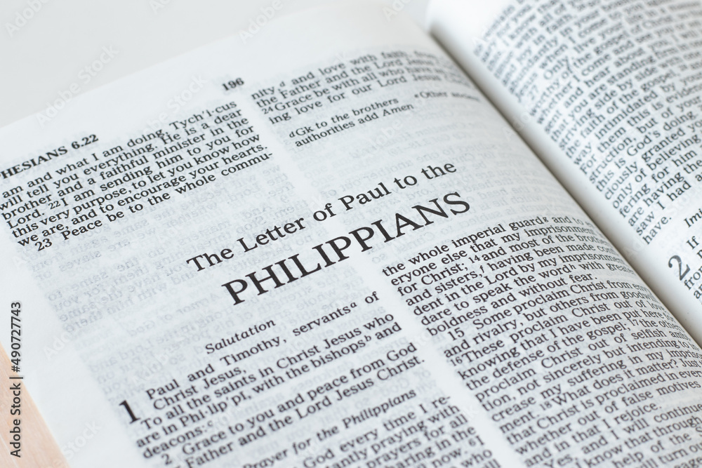Wall mural philippians open holy bible book close-up. new testament scripture. studying the word of god jesus c - Wall murals