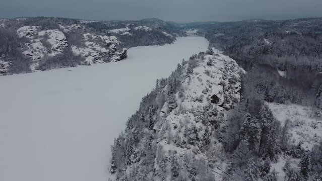 Soaring High Over Lake Dingle Dam Sweden Scenic Mountain Snow Trees 4K 30fps