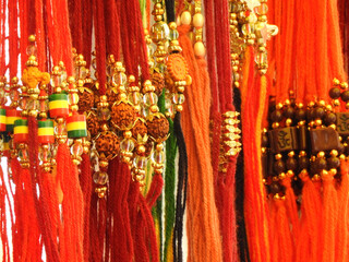 Temple shops colorful beaded dhaga string with rudrakhs in display