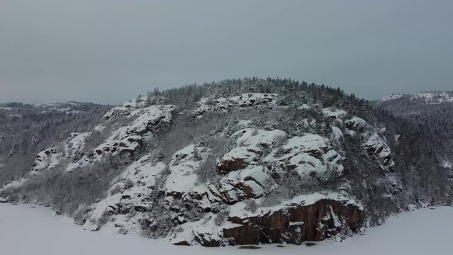 Flying to Swedish Snowy Mountain Scenic Forest Dingle Dam 4K 30fps