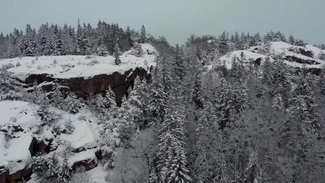 Soaring Through Snow Covered Mountain Trees Dingle Sweden 4K 30fps