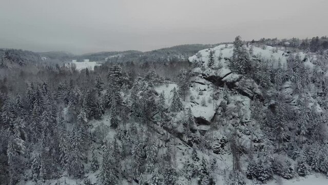 Soaring Through Dingle Mountain Snow Covered Trees Road Cabin Sweden 4K 30fps