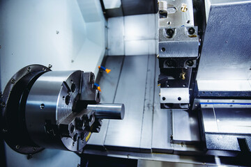 Obraz na płótnie Canvas Closeup industry CNC drill robot turning milling factory metal machine