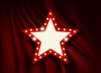 Star with light bulbs on the background of the scene.