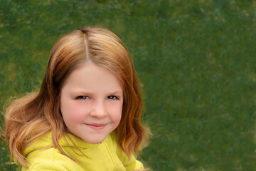 girl playing good game with goslings outdoors on green grass