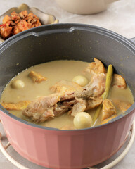 Opor Ayam (Indonesian Yellow Chicken Curry) for Lebaran Menu, Usually Served with Ketupat