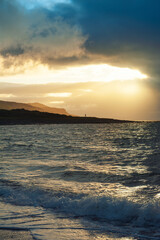 Fototapeta premium Beautiful dramatic blue sea waves and gloomy sky