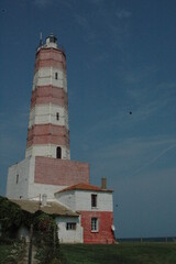 European Lighthouse Near the Shore