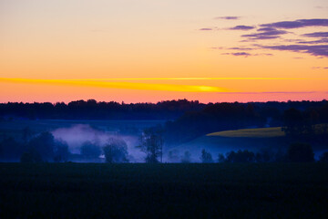 Fototapeta premium Beautiful, colorful skies during the spring sunrise. Seasonal scenery of Northern Europe.