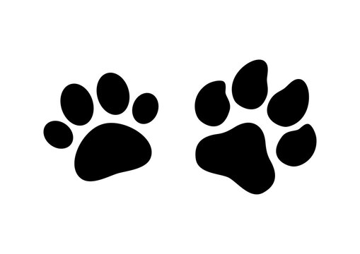 Cat and dog animal paw print icon set vector isolated on a white background. Animal paw print black silhouette design element isolated on a white background. Cat and dog pawprint vector
