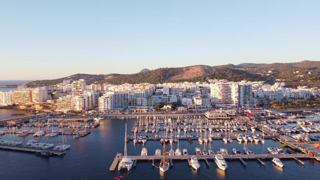 Aerial video of the Sant Antoni marina in Ibiza. Docks with boats and yachts.