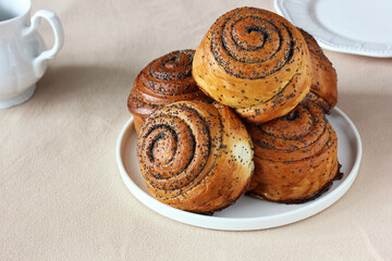 sweet rolls with poppy seeds, flour products.