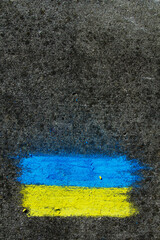 Flag of Ukraine. Chalk drawing on sidewalk. Creative support by children for Ukraine. Copy space for your text