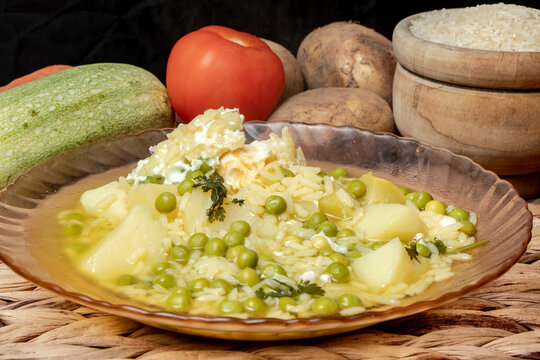 Potato broth with rice and peas with poached eggs in the same broth, a highly appreciated dish in the gastronomy of the Canary Islands.