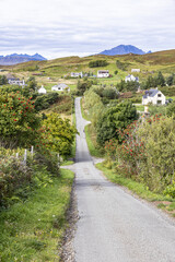 The lane to the village of Tarskavaig on the Sleat Penisula in the south of the Isle of Skye,...